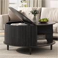 SULIVES Black Round Coffee Table with Storage, 31.5" Wood Drum Table, Fluted Circle Center Table for Living Room, Modern Mid Century Furniture with Sliding Door